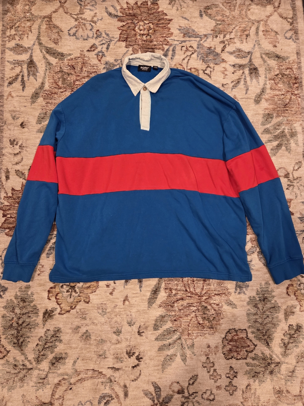 Classic Blue Long-Sleeve Polo with Red Stripe